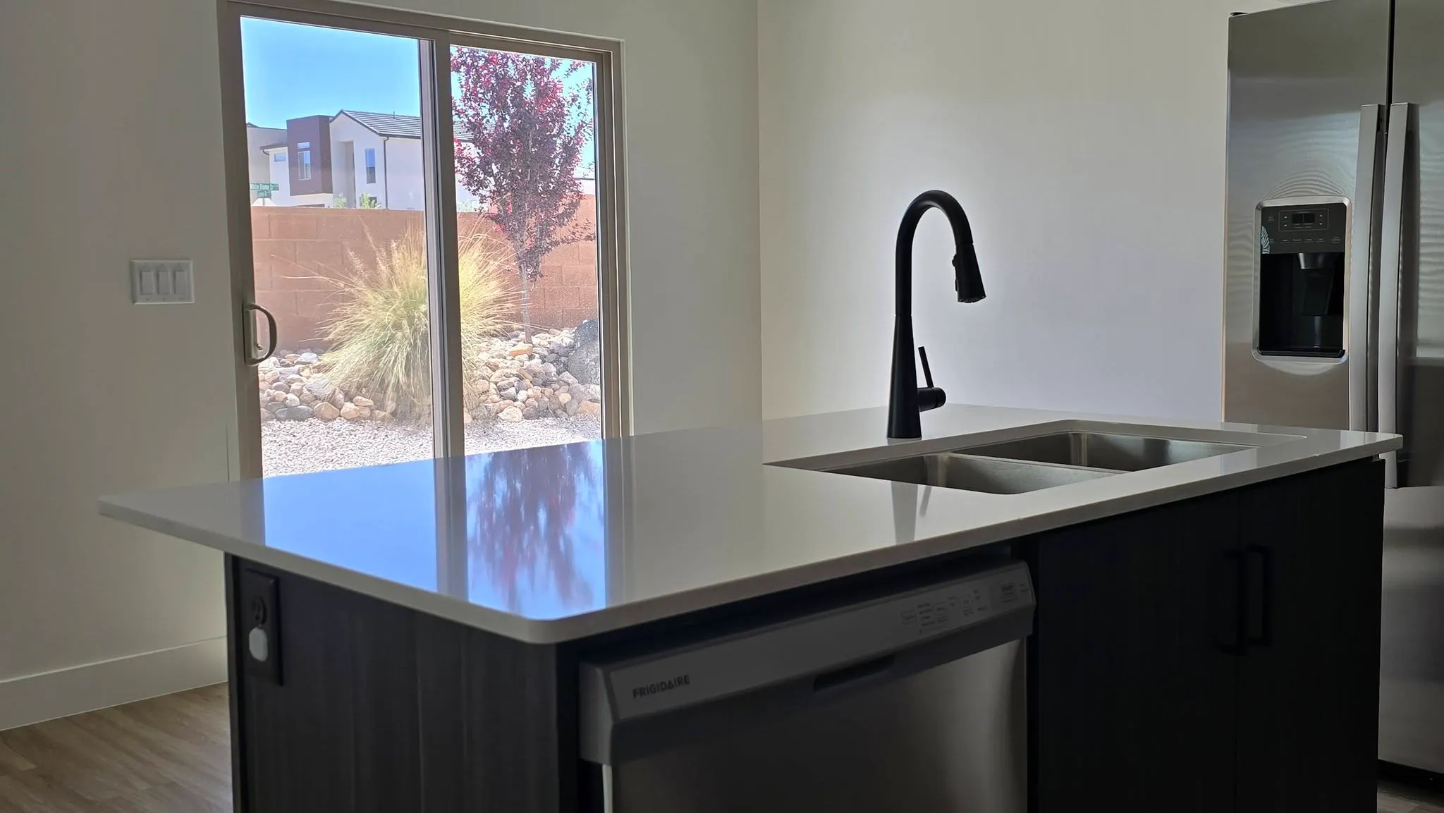 Clean polished kitchen counters after detailed house cleaning