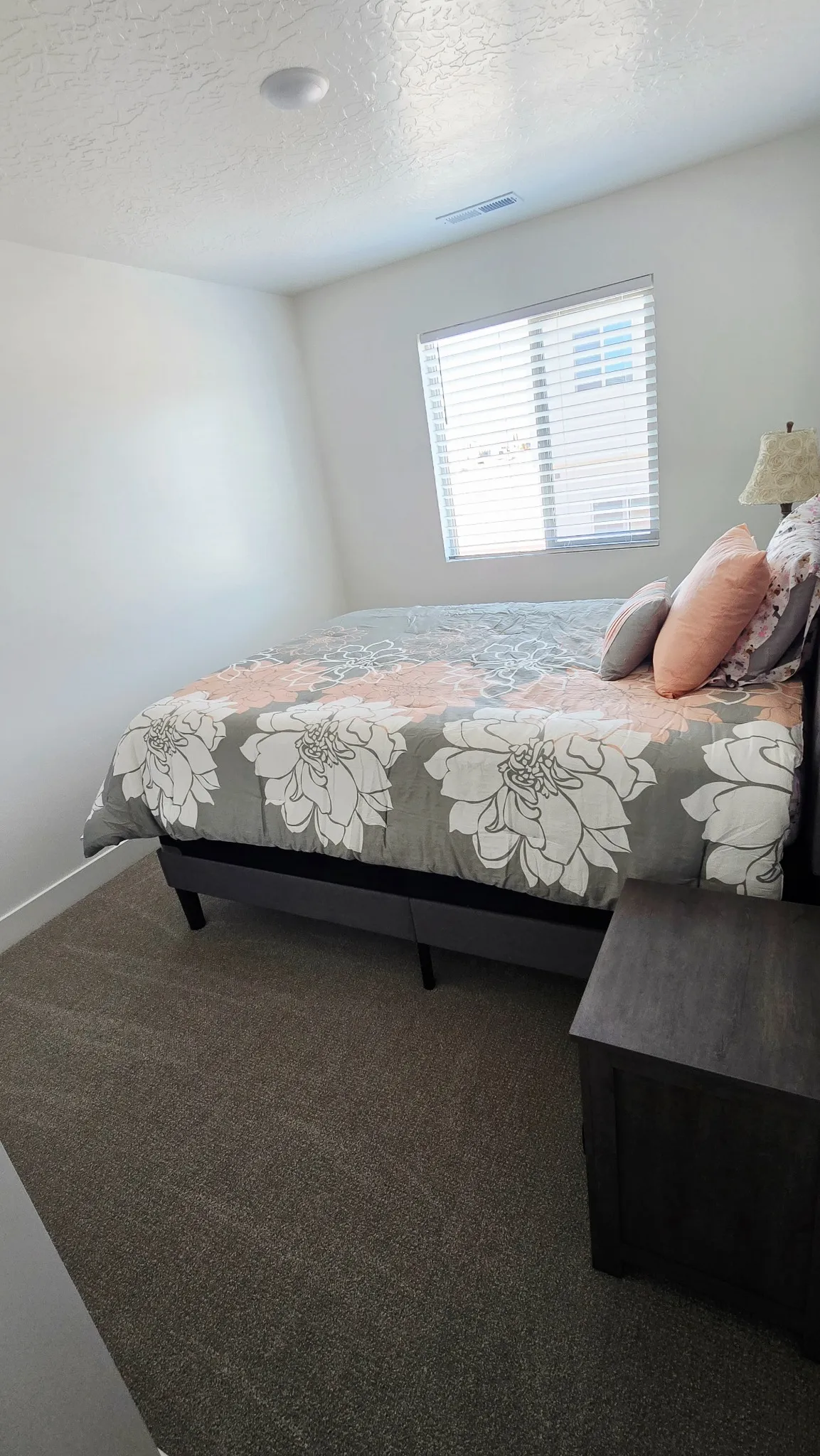 Clean, well-maintained bedroom in an everyday Southern Utah home