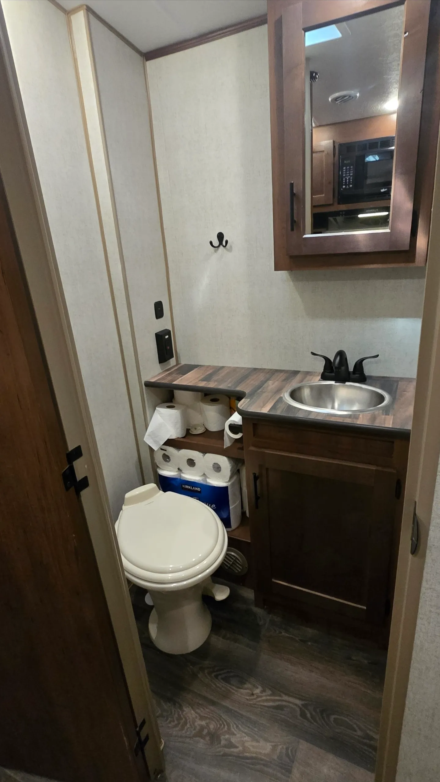 Clean RV bathroom sink and toilet