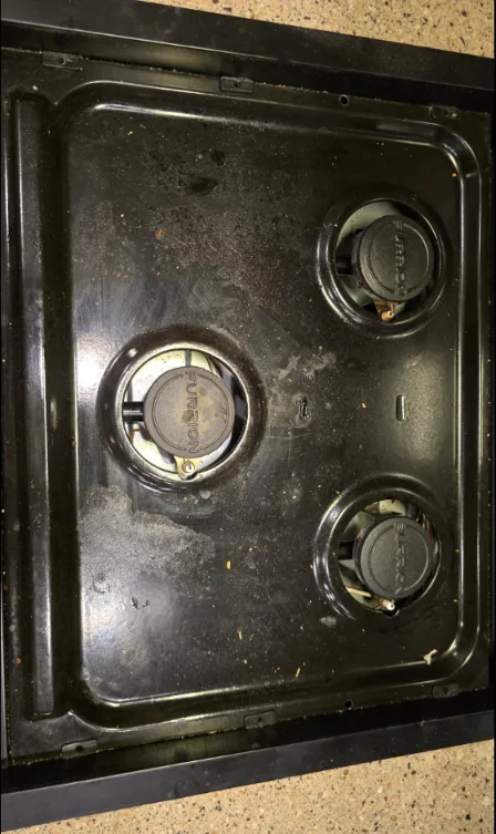 RV cooktop before cleaning