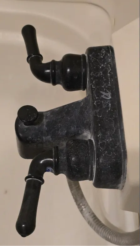 RV shower faucet before cleaning